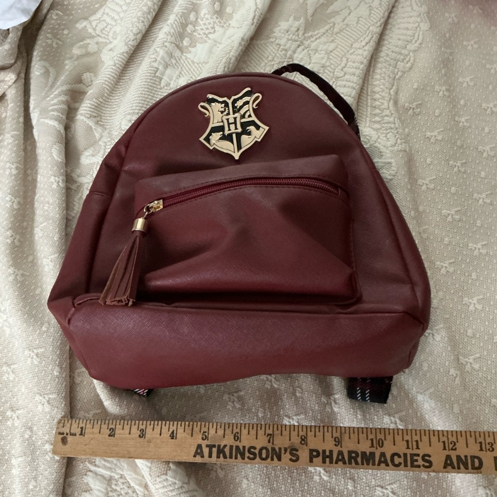 HARRY POTTER HOGWARTS, Burgundy Mini Backpack with Gold Crest Accent